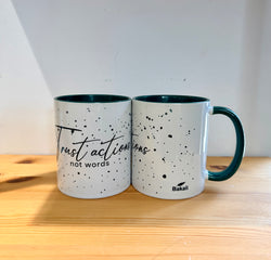Cup with quotes-Trust actions not words-